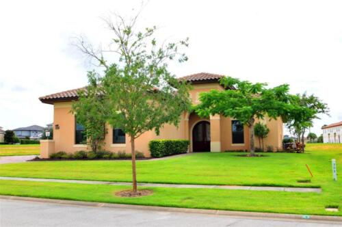 Coyote-Creek-Way Custom Home with Collector's Garage Reunion FL